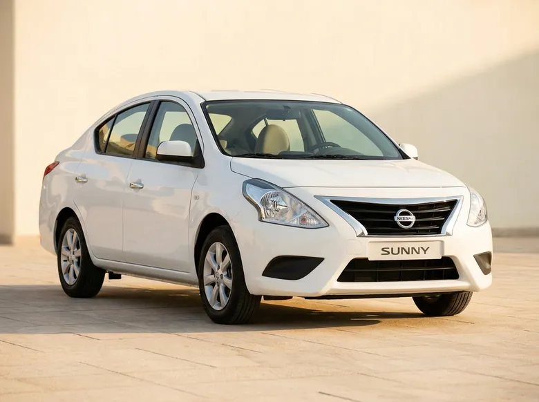 White Nissan Sunny compact sedan
